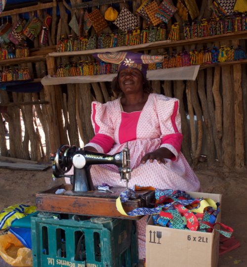 Herero lady sewing, Namibia